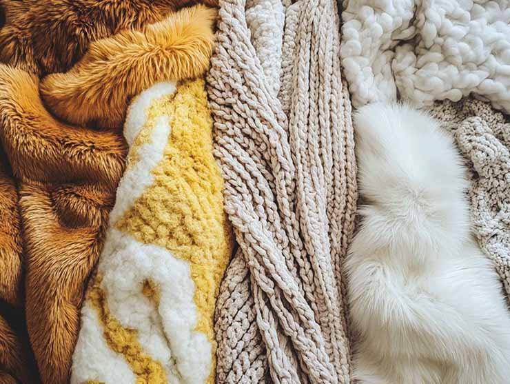 Different blankets by color and materials