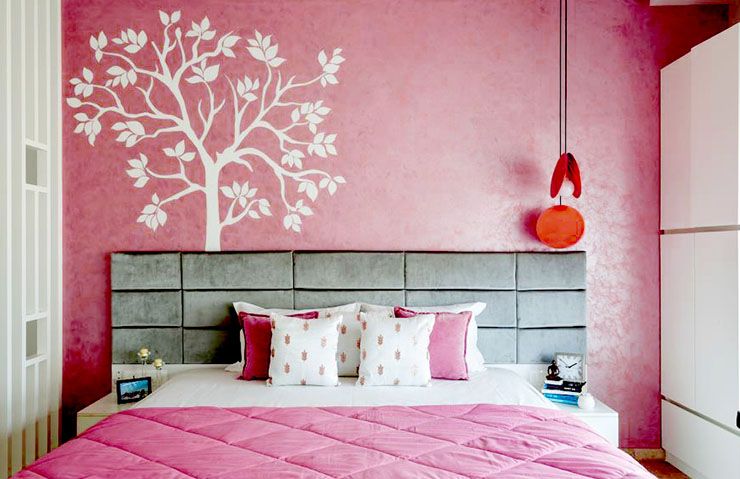 Pink room with a pink bed